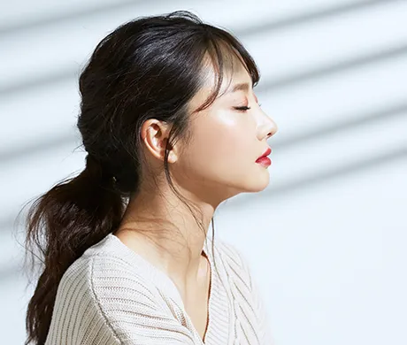 asian woman profile on white background