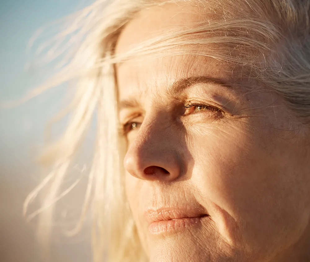 older woman in the sun