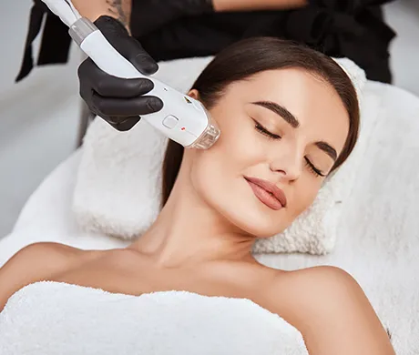 woman receiving laser treatment